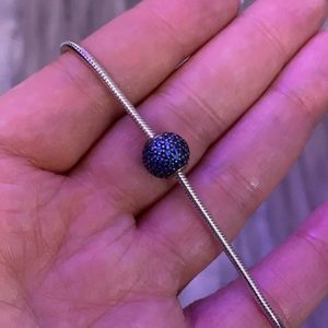 1 Pandora essence bracelet and one blue bead